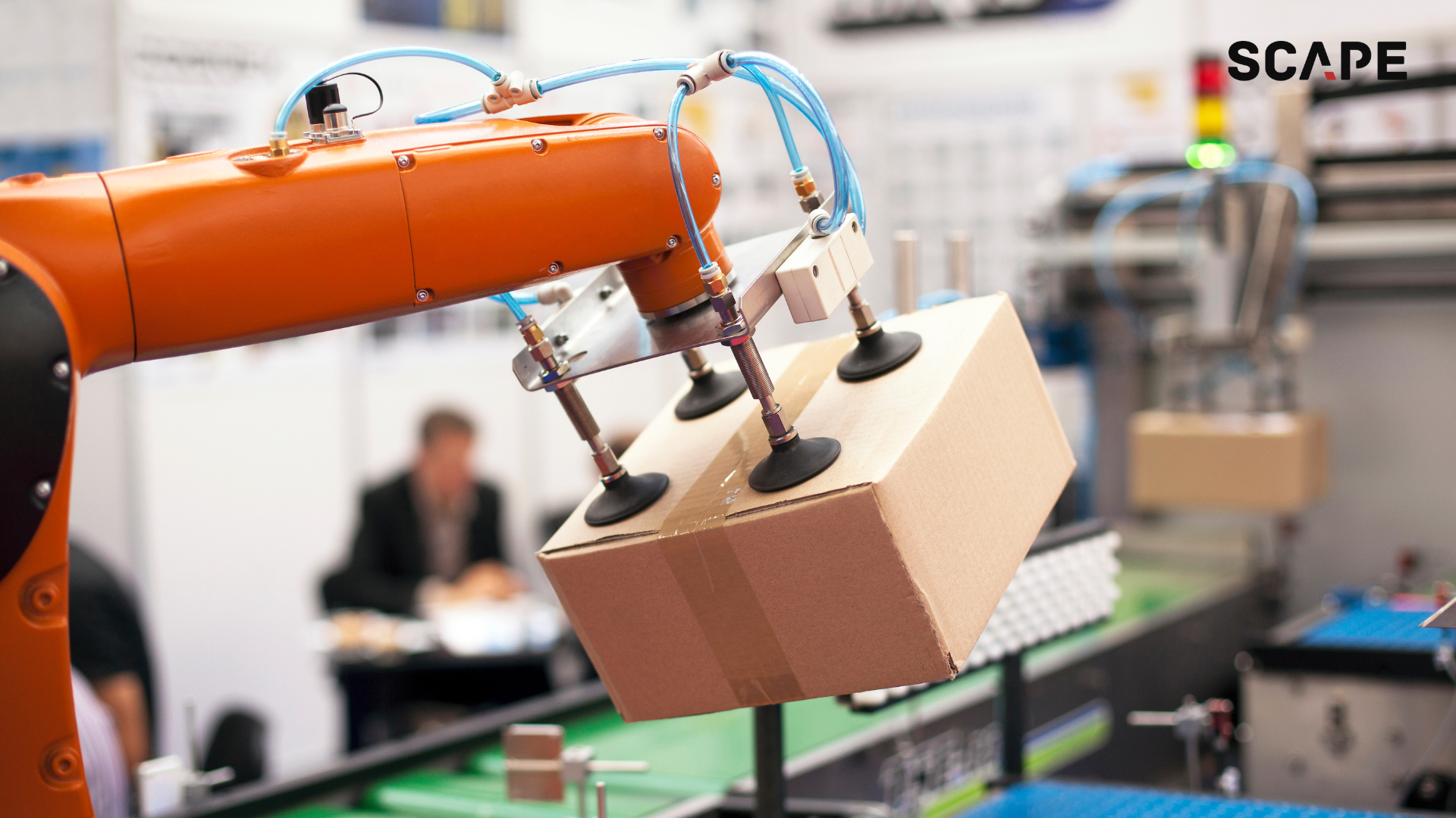 Mögliche SCAPE PackMover-Integration auf einem KUKA Roboter zur Automatisierung des Pakethandlings in der Logistik.